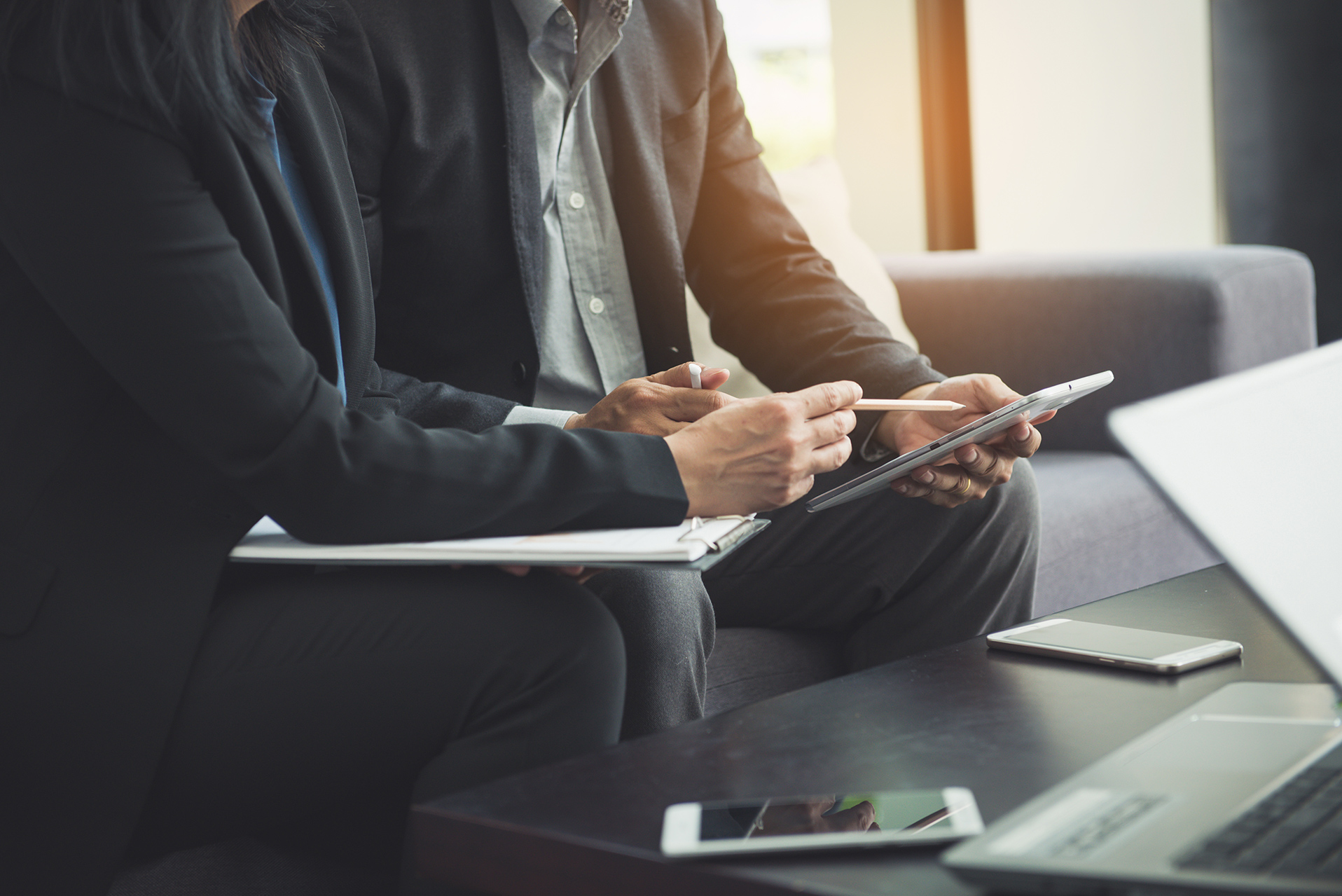 Tax expert reviewing HST rebate with client